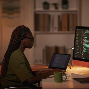 African-American Woman Writing Computer Code