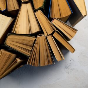 Book background. Old books in the library. Bookshelf shop. Knowledge, publications, literature